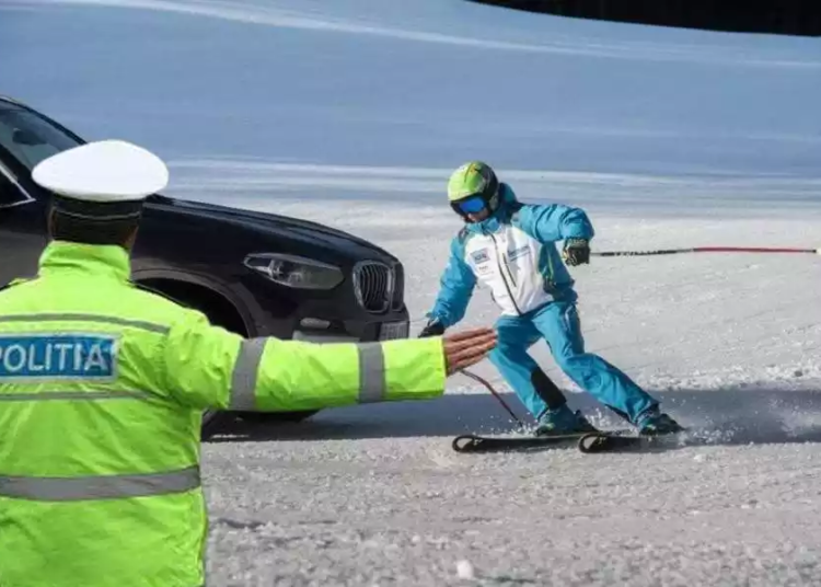 OFICIAL: Polițiștii din Brașov, scoși să dirijeze BMW-urile care circulă pe pârtiile de schi
